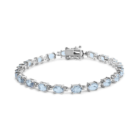 .925 Sterling Silver 11.0 Cttw Oval Shaped Created Light Blue Topaz Link Bracelet - 7 inch